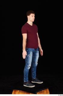 Tomas Salek black shoes blue jeans casual clothing dressed red…